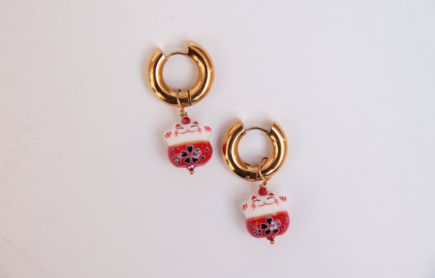 Aretes Maneki